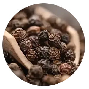 Round photo of black peppercorns