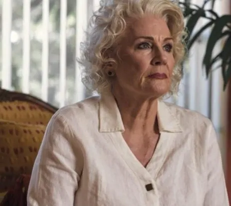 An older woman with a worried expression